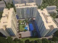 Aerial view of residential complex towers and central courtyard