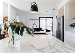 Contemporary kitchen counter with modern fixtures and decor